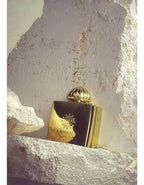Amouage Gold Eau de Parfum luxury perfume bottle with elegant gold accents, showcasing a rich floral oriental fragrance for men and women.