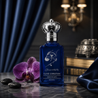 Clive Christian Jump Up and Kiss Me Addictive Arts Ecstatic luxury Eau de Parfum in a blue bottle with silver crown cap, orchid and premium dark background.